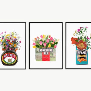 May include: Three framed art prints showcasing floral arrangements in repurposed containers. A Marmite jar holds wildflowers, a Yorkshire Tea box displays tulips, and a Beanz can features a sunflower. The Marmite jar, Yorkshire Tea box, and Beanz can are all recognizable British food brands.
