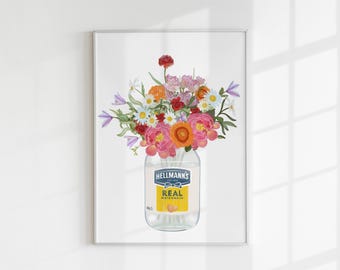 May include: A framed art print featuring a colourful bouquet of assorted flowers, including pink peonies, orange marigolds, and white daisies, arranged inside a glass Hellmann's Real Mayonnaise jar with the brand label clearly visible on the front.