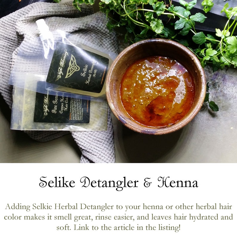 May include: Two clear plastic pouches with labels that read "Selkie Herbal Detangler (Refill)" and "Fire Genasi Copper Keratin Hair Color". A brown ceramic bowl filled with a reddish-brown henna paste.