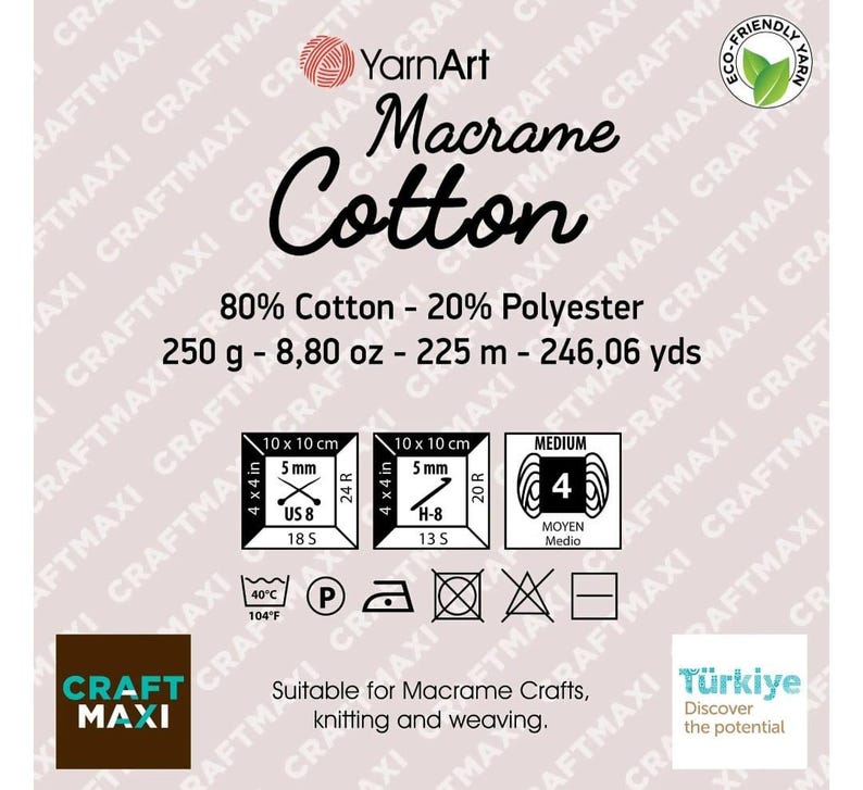 May include: YarnArt Macrame Cotton yarn label featuring 80% cotton and 20% polyester composition. It lists 250 g, 8.80 oz, 225 m, and 246.06 yds. Includes icons for 5 mm knitting needles, 5 mm crochet hooks, medium weight 4, and laundry care instructions.