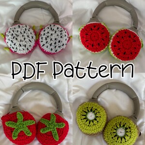 May include: A collection of four pairs of headphones with crocheted fruit-themed ear covers. The fruits include dragon fruit, watermelon, tomatoes, and kiwi. The text "PDF Pattern" is displayed in the center of the image.