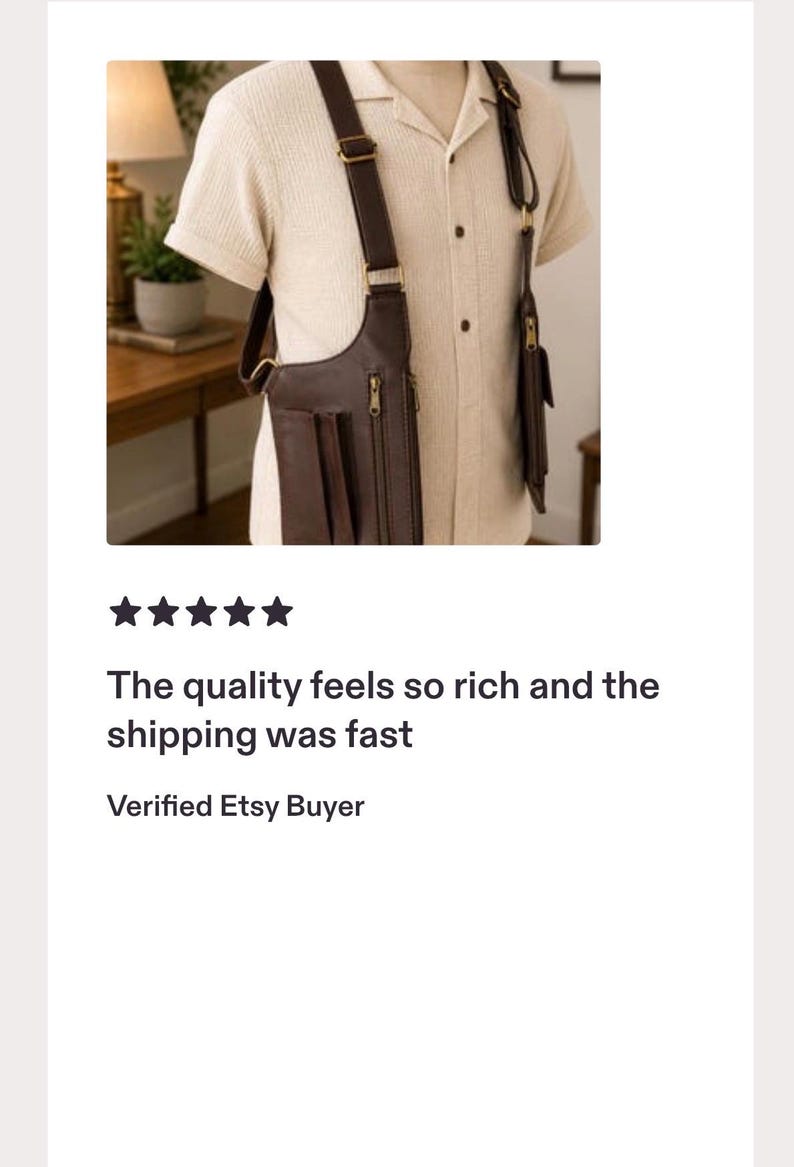 May include: A dark brown leather shoulder holster bag with adjustable straps and metal hardware, worn over a short-sleeved cream-colored button-down shirt. The bag features multiple zippered compartments and pockets for storage on the front side.