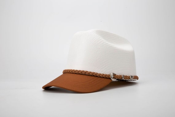 Cowboy Cap: Half Cowboy Hat, Half Ball Cap.