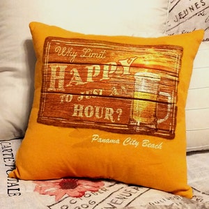 Mustard yellow square memory pillow made from a T shirt with a wooden sign design. The sign reads "Why Limit HAPPY to Just An HOUR?" with a beer mug graphic and "Panama City Beach" text.