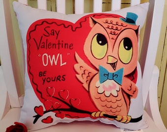 May include: A white pillow with a red heart-shaped design featuring a pink owl wearing a blue bow tie and a blue top hat. The text on the heart reads "Say Valentine "OWL" Be Yours" and is surrounded by small red hearts.