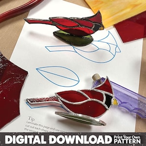 May include: A stained glass cardinal pattern with instructions to laminate the page, cut out the shapes, and use one as a template for the second cardinal. The text "Digital Download Print Your Own Pattern" is at the bottom of the page.