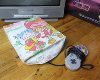 Strawberry Shortcake console dust cover, handmade from vintage children’s bed sheet - WRETRO WRAPPER