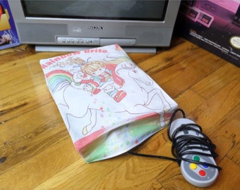 Rainbow Brite console dust cover, handmade from vintage children’s bed sheet - WRETRO WRAPPER