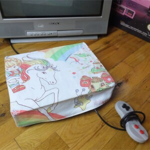 Rainbow Brite console dust cover, handmade from vintage children’s bed sheet - WRETRO WRAPPER