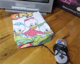 Duck Tales console dust cover, handmade from vintage children’s bed sheet - WRETRO WRAPPER