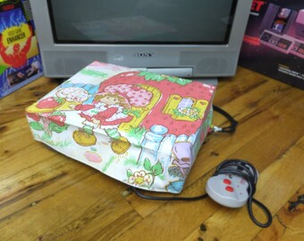 Strawberry Shortcake console dust cover, handmade from vintage children’s bed sheet - WRETRO WRAPPER