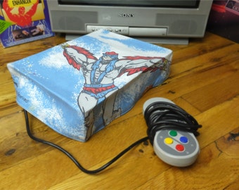 He-Man Stratos console dust cover, handmade from vintage children’s bed sheet - WRETRO WRAPPER
