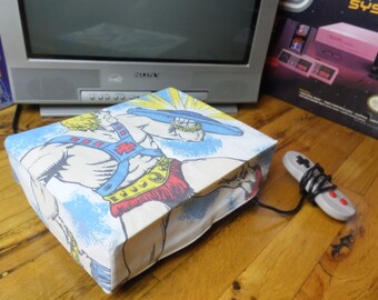 He-Man console dust cover, handmade from vintage children’s bed sheet - WRETRO WRAPPER