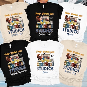May include: A collection of t-shirts with the Universal Studios logo and the text "Family Vacation 2025". The shirts are in various colors, including black, white, and beige, with different text such as "Birthday Girl", "Custom Text", "Mommy", "Magical Memories", "Daddy", and "Smith's Trip".