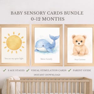 Peut inclure: Ensemble de cartes sensorielles pour bébés de 0 à 12 mois. Trois impressions encadrées à l'aquarelle avec un soleil, une baleine et un ours. Le texte comprend "You are my quiet light", "Move Gently" et "Stay Curious".