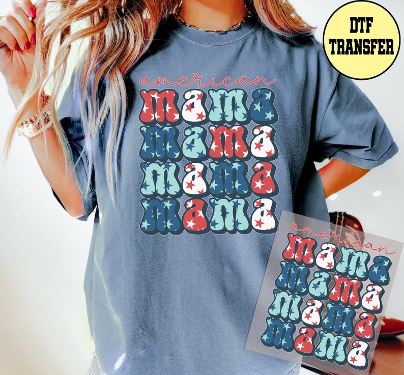May include: A blue t-shirt with the words "american mama" in a retro font. The word "mama" is repeated four times in a grid pattern, with red, white, and blue star accents. A DTF transfer is visible.