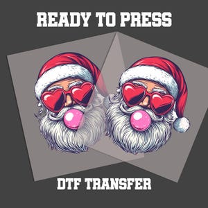 May include: Illustration of two Santa Clauses wearing heart-shaped sunglasses and blowing pink bubble gum bubbles. They have white beards and red Santa hats. The words "READY TO PRESS" and "DTF TRANSFER" are at the top and bottom.