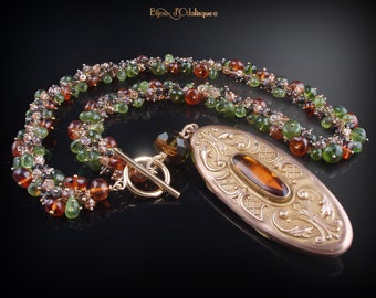 Art Deco Locket Necklace with Vessonite, Hessonite Garnet, Peridot, Andalusite, Zebra Garnet, and Zircon