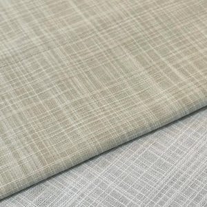 May include: Two pieces of fabric with a visible cross-hatch weave pattern. The top piece is a light beige colour with the word Natural printed in black script. The bottom piece is a solid white colour. Both fabrics feature a textured grid design.