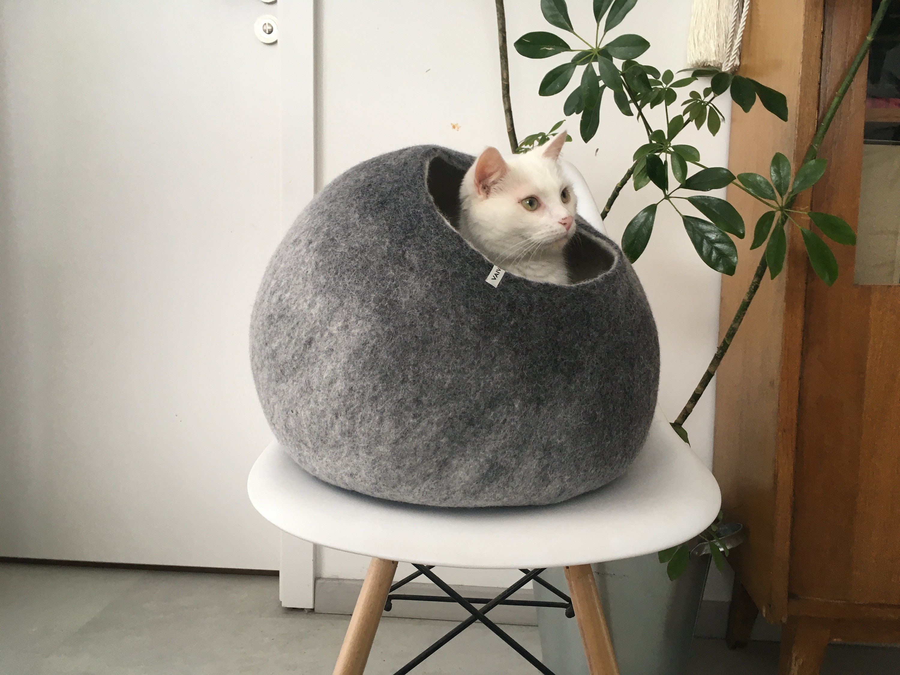 Our felted cat or dog bed is a perfect modern piece of pet bed furniture Felted warm Halloween cat nap cocoon from natural merino wool 