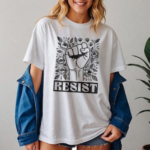 Resist Floral Fist Graphic Tee - Protest Activism Unisex T‑Shirt with Bold Fist & Flower Design, Empowerment Political Statement Top