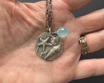 Sterling and Fine Silver Etched 18" Necklace with Round Seashell and Starfish Pendant and Caribbean Blue Chalcedony Teardrop