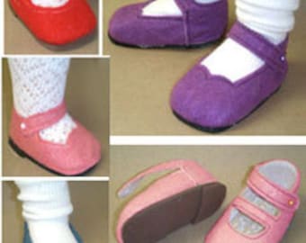 May include: Four pairs of doll shoes in red, purple, pink, and blue. The shoes are all closed-toe with a strap across the instep.