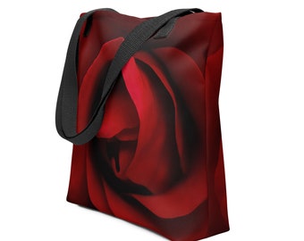 Op de afbeelding: Een rode tote bag met een close-up afbeelding van een rode roos.