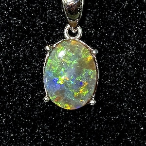 1.7 CT. Australian Black Opal in sterling silver Pendant