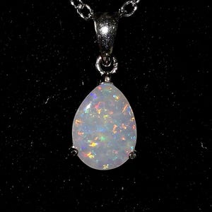 Solid .7 CT. Australian Opal in Silver Pendant