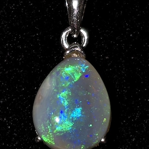 2.2 CT Solid Dark Mintabie Australian Opal in ss Pendant.