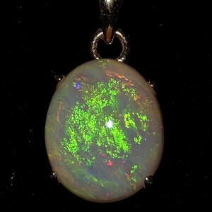 3.1 CT. Solid Coober Pedy Opal in Gold Colored ss Pendant.