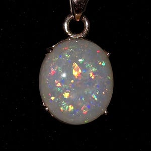 3.9 CT. Solid Natural Coober Pedy Opal in Rose Gold colored ss Pendant.