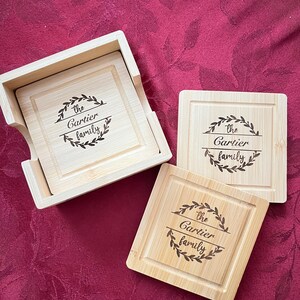 CUSTOM MONOGRAM COASTERS Wood coaster set with your monogram Engraved into each coaster and Coaster Holder. Set contains four coasters.