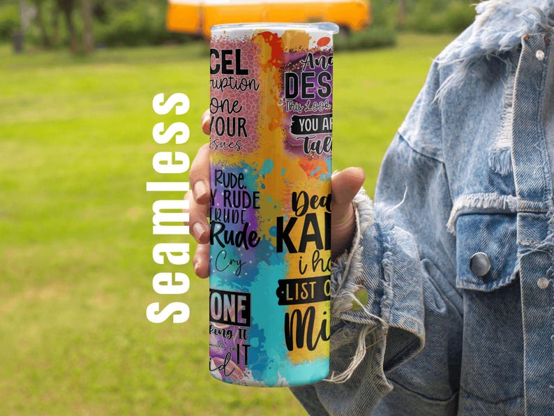 May include: A colorful tumbler with a seamless design, featuring text in various fonts and colors. The tumbler has a mix of orange, blue, and purple hues. The text includes phrases like "Rude", "Dead", and "One".