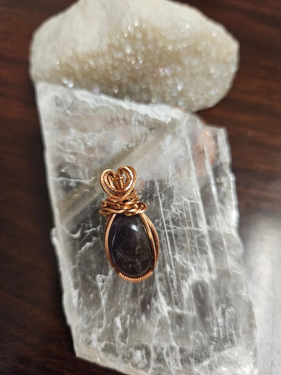 Amethyst stone wrapped in copper!