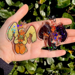 Good Omens Double Sided Holographic Keychain