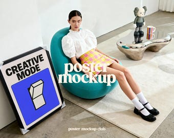 May include: A canvas poster mockup leaning against a wall, featuring the words "CREATIVE MODE" and a graphic of an open box. A person sits on a teal beanbag chair, wearing a white top and plaid skirt. The words "poster mockup" are overlaid on the image.