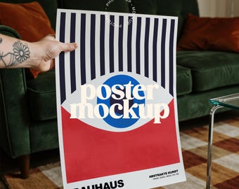 May include: A poster mockup with a Bauhaus design. The poster features vertical navy blue and white stripes at the top, a red section at the bottom, and a blue circle with the words "poster mockup" in white. The word "BAUHAUS" is printed at the bottom.