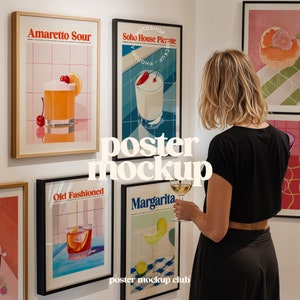 May include: A collection of framed cocktail posters, including "Amaretto Sour," "Soho House Picante," "Old Fashioned," and "Margarita." The posters feature colorful illustrations of the drinks. The words "poster mockup" and "poster mockup club" are also visible.