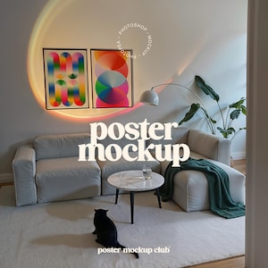 May include: A white couch with a green throw blanket and a round coffee table with a glass of water on it. Two colorful abstract posters hang on the wall above the couch. The text "poster mockup" is written in white letters on the wall.