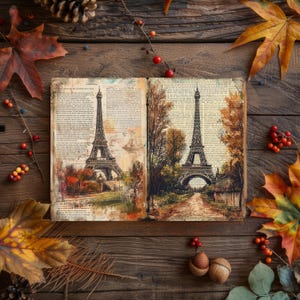 May include: An open book with a vintage illustration of the Eiffel Tower in Paris, France. The book is surrounded by autumn leaves and berries on a rustic wooden surface.