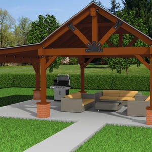 Può includere: Un pergolato in legno con una finitura colorata marrone e un pavimento in cemento grigio. Il pergolato ha un tetto a due falde ed è sostenuto da quattro pilastri. Sotto il pergolato ci sono un barbecue e mobili da giardino.