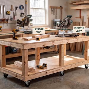 May include: A rectangular wooden workbench with a lower shelf and four caster wheels. The workbench features a light wood finish and measures 96 inches in length, 48 inches in depth, and 31 1/4 inches in height as indicated by text labels.