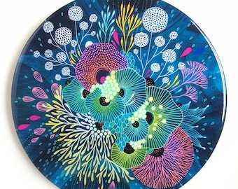 Resin covered print on round panel, Seedling