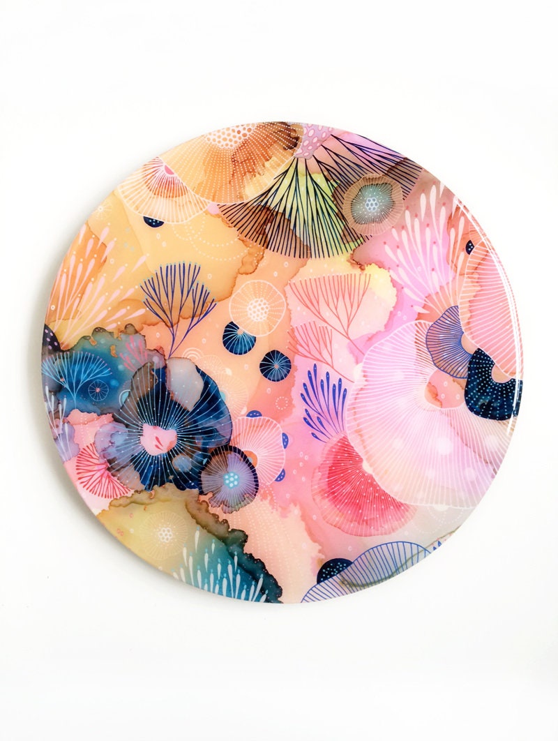 Resin covered print on round panel, Dive
