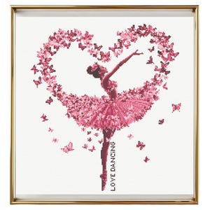 May include: A pink ballerina dances in a heart shape formed by pink butterflies. The ballerina's skirt is made of butterflies. The text "LOVE DANCING" is written vertically on the right side of the image.