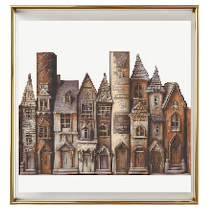 May include: A cross-stitch pattern depicting a row of brown, grey and white buildings with pointed roofs and windows. The buildings are set against a white background.