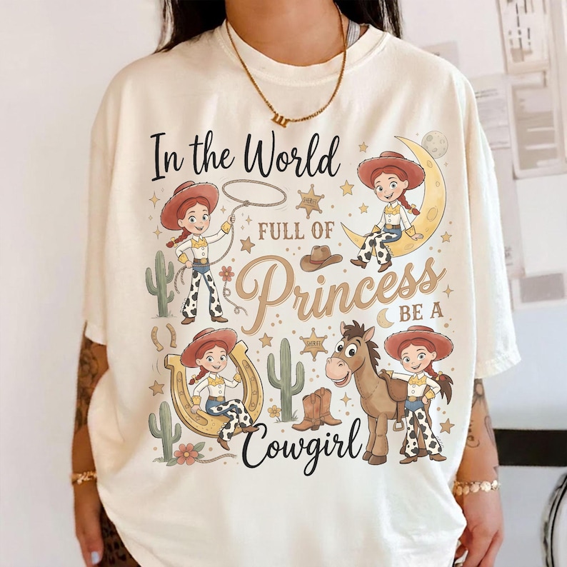 Toy Story Jessie And Bullseye Shirt, In a World Full of Princesses Be a Cowgirl Tee, Pixar Movie Fan Gift, Disney Western Cowgirl Outfits bild 1