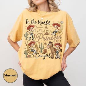 Toy Story Jessie And Bullseye Shirt, In a World Full of Princesses Be a Cowgirl Tee, Pixar Movie Fan Gift, Disney Western Cowgirl Outfits Mustard (Comfort)